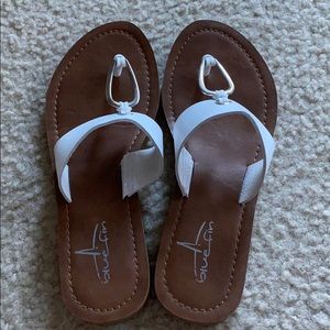 Blue fin white and tan sandals size 7.